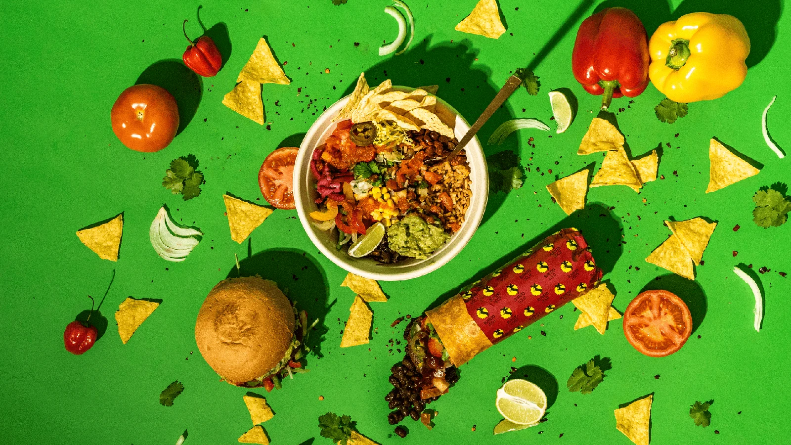 Burrito Loco bowl with fresh vegetables and tortilla chips