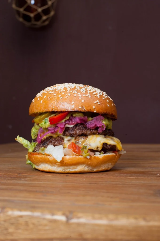 Burrito Loco burger with melted cheese and fresh toppings