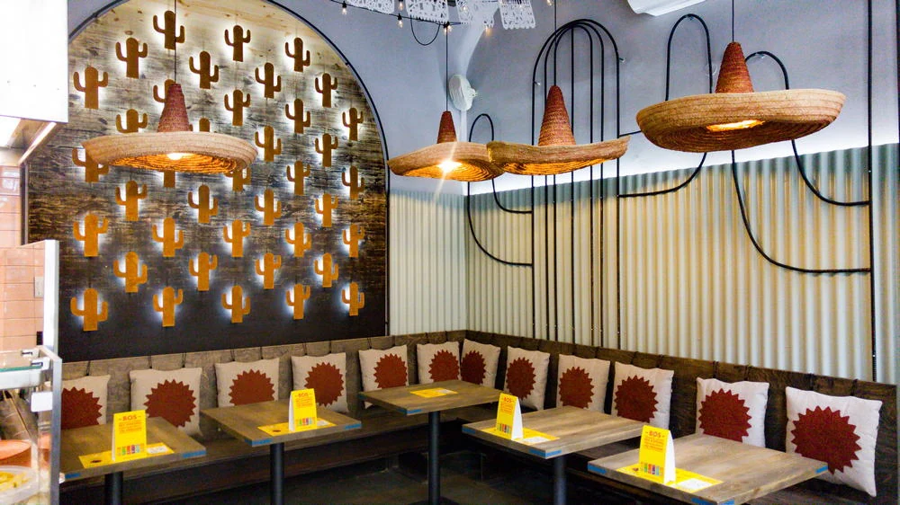 Interior of a Burrito Loco restaurant with colourful Mexican-inspired decor